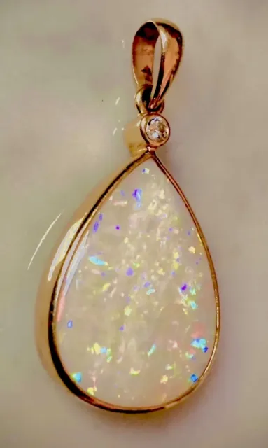 Opal pendant set in 18ct yellow gold & Dimond. Coober Pedy Australian.