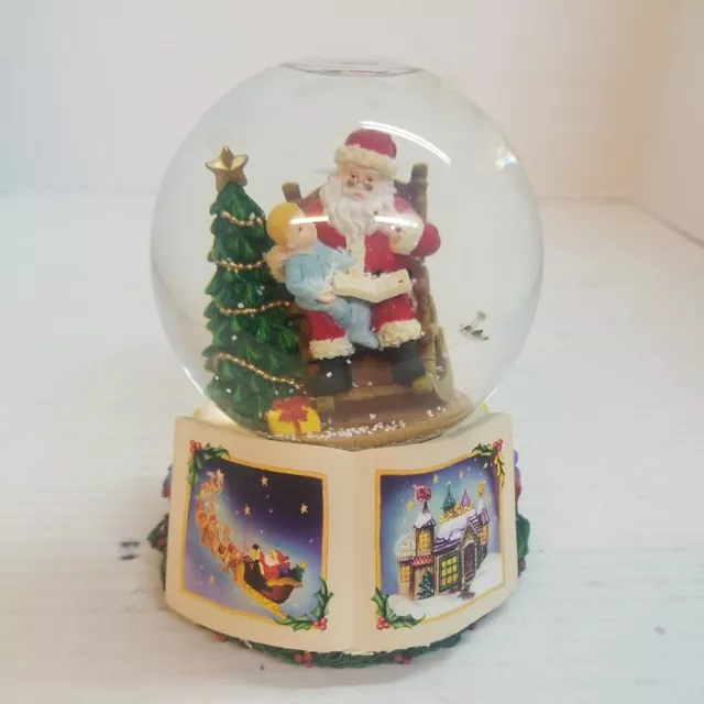 Target Corp Snow Globe; Child on Santa's Lap