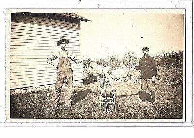 Real Photo Postcard RPPC - Hunting Man in Overalls with Boy and Bird of Prey