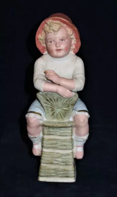 Gebruder Heubach Schutz-Marke Girl Sitting on Chair w/ Cigar Porcelain Figurine