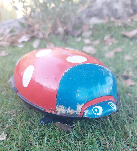 Ancienne coccinelle jouet mécanique à ressort avec sa clef - BERUSKA