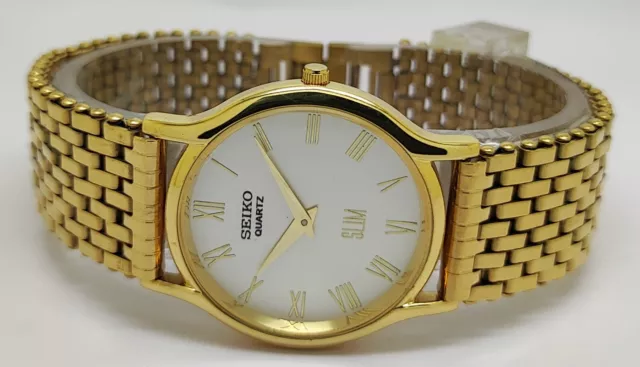 SEIKO QUARTZ SUPER Slim Men Steel Wrist Watch Japan Made Roman