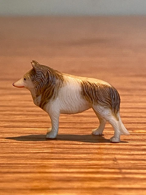 Vintage hand Carved bovine Bone dog miniature nice!