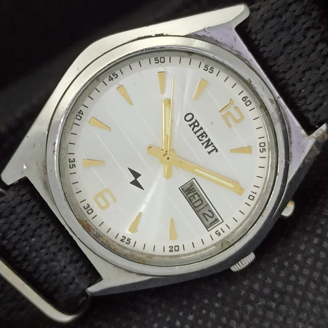 VINTAGE ORIENT AUTOMATIC 46941 JAPAN MENS D/D WHITE SILVER WATCH 551i-a297883-1