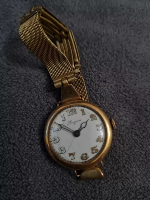 - Montre Longines en Or 18k -