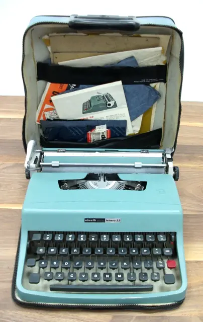 Máquina de escribir y estuche portátil vintage Olivetti Lettera 32 (dañado)