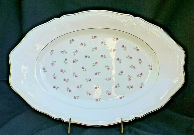 Grand plat ovale ancien en porcelaine de Limoges semi de roses