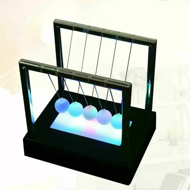 Newtons LED Light Up Ball Kinetic Energy Cradle Hogar Ciencia Juguetes... 2