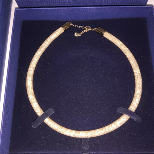 SWAROVSKI CRYSTAL STARDUST TUBE NECKLACE  17" LONG IN GOLD COLOR-USED w BOX