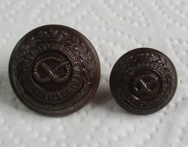 2xUK Army:"NORTH STAFFORDSHIRE REGT BRONZED BUTTONS" (26mm-19mm, Mid WW2 Period)