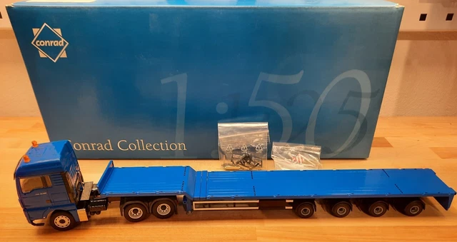 Conrad MAN 8.90F Bleu/gris échelle 1:50 – Occasion En Boîte