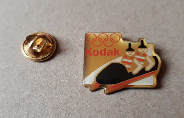 Jeux Olympiques - Pin' s doré Sports J.O ALBERTVILLE 92 avec Sponsor RICOH