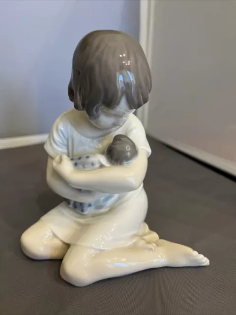 Royal Copenhagen Porcelain Girl With Doll Figurine 1938  Denmark