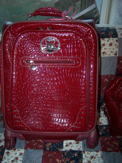 set of 2 Kathy Van Zeeland luggage. red croco pvc designer luggage.