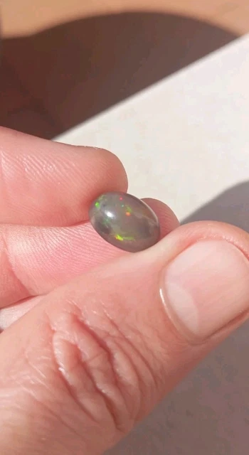 ES 2.915 ct. NEGRO OPAL NATURAL ETHIOPIA PERA CABOCHON MULTICOLOR | UK