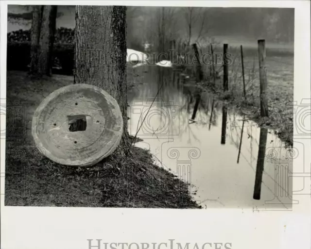 1982 Press Photo Mill Stone against a Tree along Stream in Hatfield - sra29659