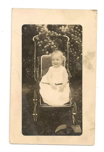 An Infant In Vintage Baby Carriage Black and White Real Photo Postcard Unused
