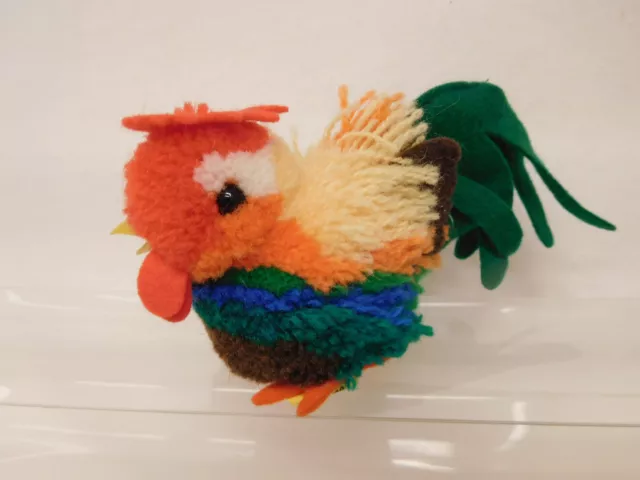 MES-56732	Älteres Steiff Woll Huhn mit Knopf und Fahne mit Gebrauchsspuren