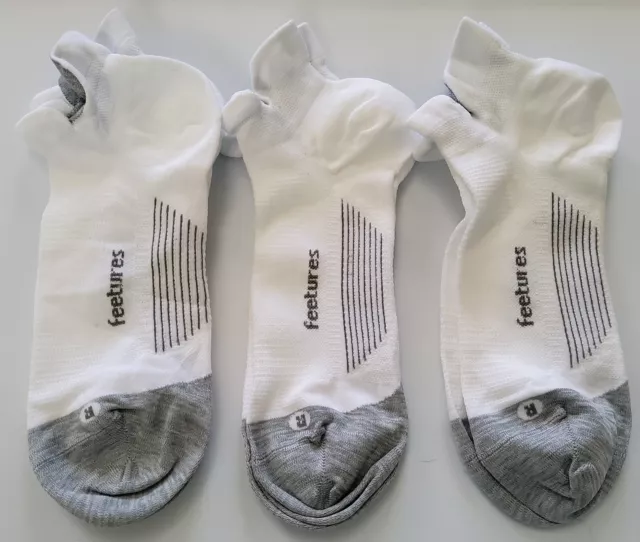 3 Pairs Feetures. Elite Light Cushion No Show Tab Ankle Socks White Size M