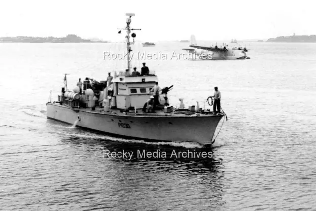 Zmk-87 Royal Navy Warship with P1030 Sunderland Flying Boat. Photo