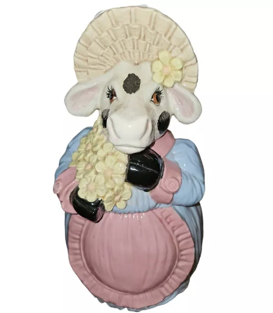 https://www.picclickimg.com/97sAAOSwGshkd-uU/Vintage-Rare-Cow-Cookie-Jar-Gown-Bonnet-Apron.webp