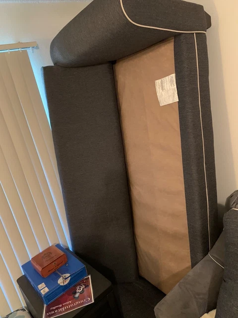 Blue three cushion couch from rooms to go