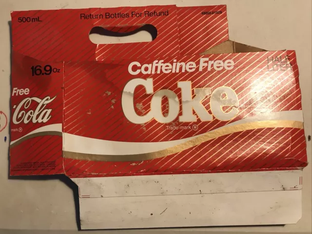 Caffeine Free Coke 8 Pack Carrier Carton 16.9 Oz Bottles Refund Paperboard used