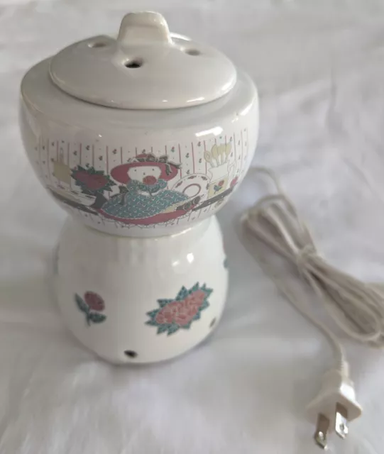 https://www.picclickimg.com/99oAAOSwfKpkvJ1y/Vintage-Robeson-Electric-Ceramic-Wax-melt-Potpourri-Warmer.webp