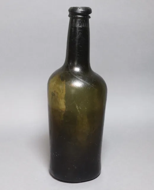 And Antique 18th Century Hand Blown Black Glass Mallet Shaped Wine Bottle.