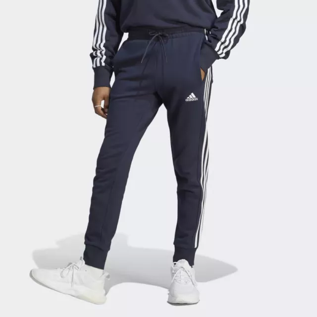 Pantalone uomo garzato polsino Adidas essentials French Terry IC9406 Blu-bianco