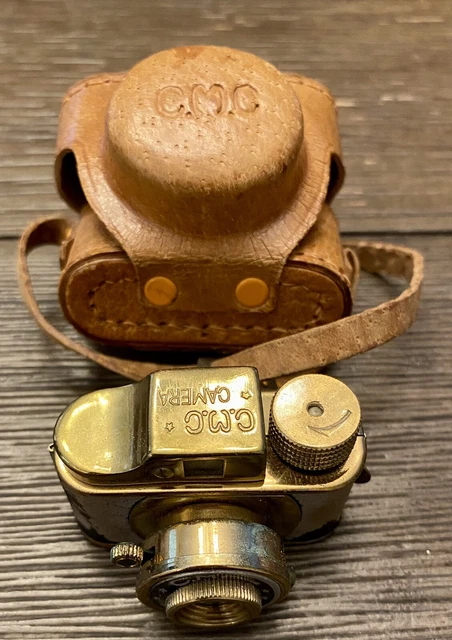 Cámara espía subminiatura vintage C.M.C década de 1950 con estuche de cuero