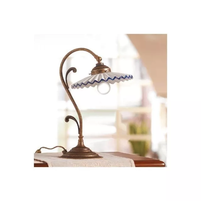Lampada per comodino camera da letto in ottone brunito con ceramica bianca e blu