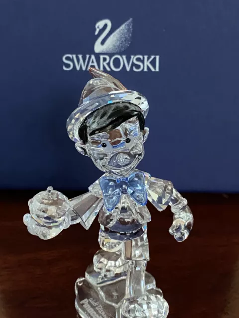 swarovski disney figurine Pinocchio with blue bow tie and in the box