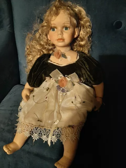17" Vintage The Leonardo Collection Sitting Girl Porcelain Doll In Dark Green &