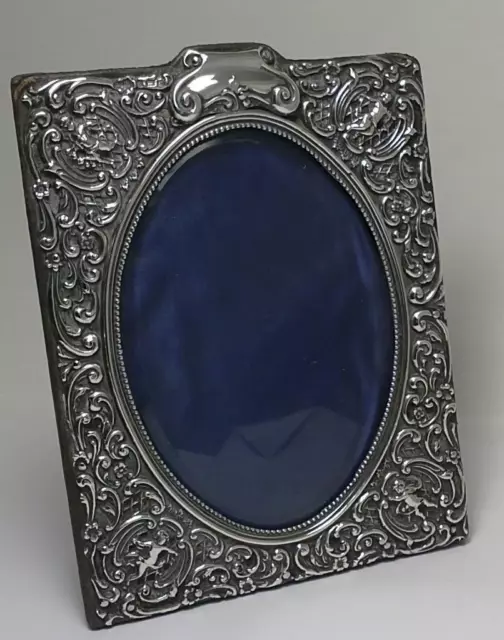 Antique Sterling Silver Fronted Cherub Photo Frame (6 ½” x 5”) – Hallmarked 1902