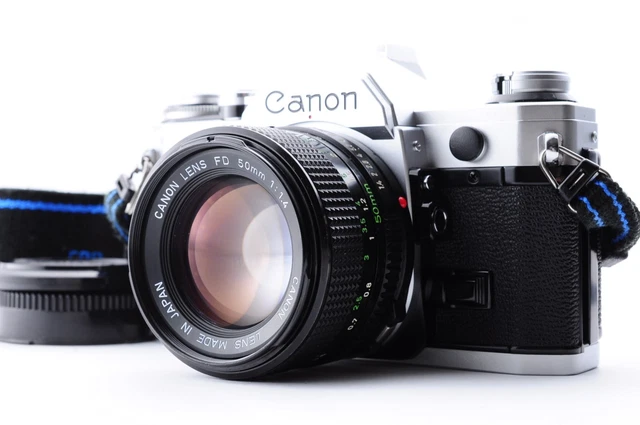 Appareil photo Canon AE-1 program + objectif FD 50mm 1:1.8 : FONCTIONNE + Accesso