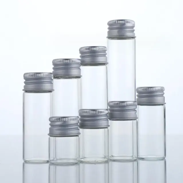 Lujosa botella de almacenamiento de vidrio transparente vacía de 5 ml-200 ml tapa plateada de aluminio