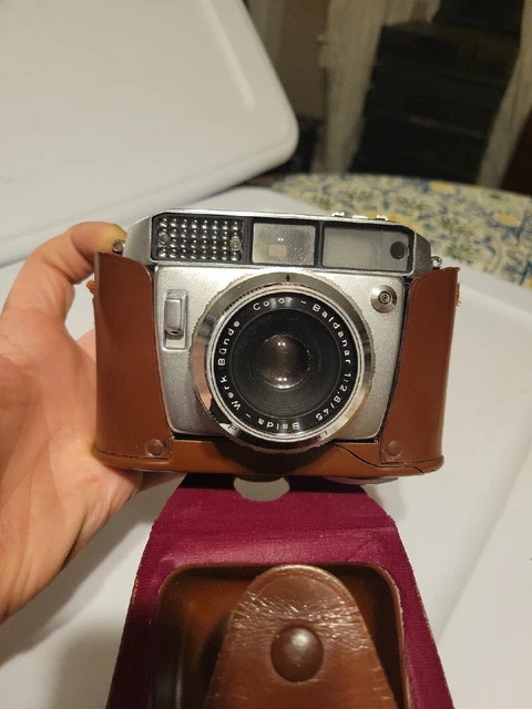 Cámara vintage Baldar 35 mm con lente Baldanar 1:1:2.8/45 con estuche Prontormat a color