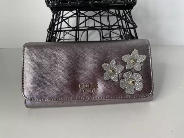 GUESS Liya Metallic Silver 3D Flower Detail Zip-Around Wristlet Wallet