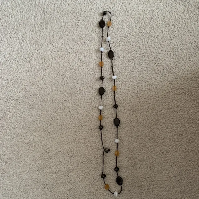 Charming Charlie Brown string beaded necklace white, brown, orange multicolored