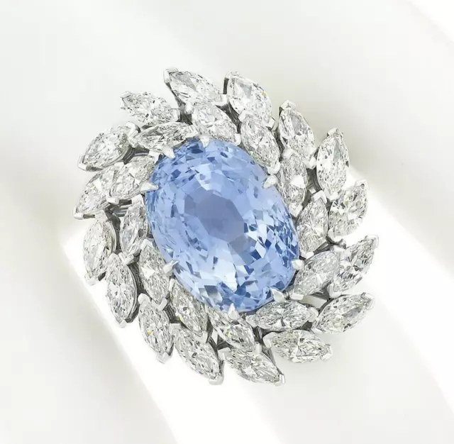 Features a Gorgeous Oval Shape Blue Lab Created Sapphire & CZ Fine Silver Ring