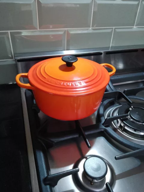 Vintage Le Creuset 22cm round casserole in volcanic orange