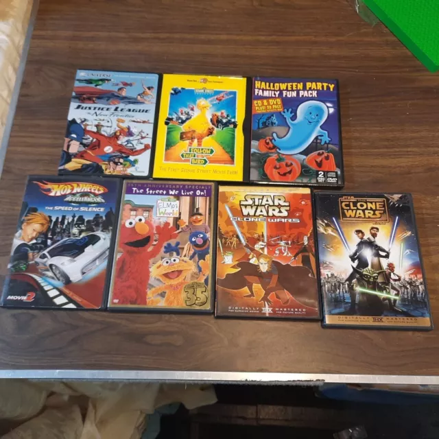 Lot of 7 Kids/Family DVDs Clone Wars, Sesame Street, Hot Wheels, Justice League