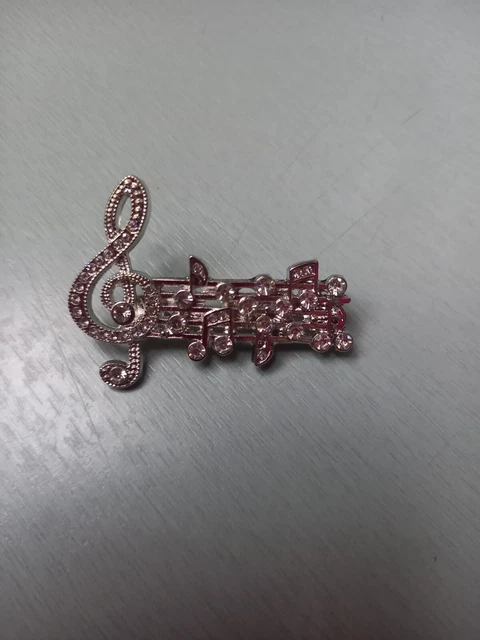 Bijoux vintage Belle broche dorée et notes de musique en strass sur la portée - France