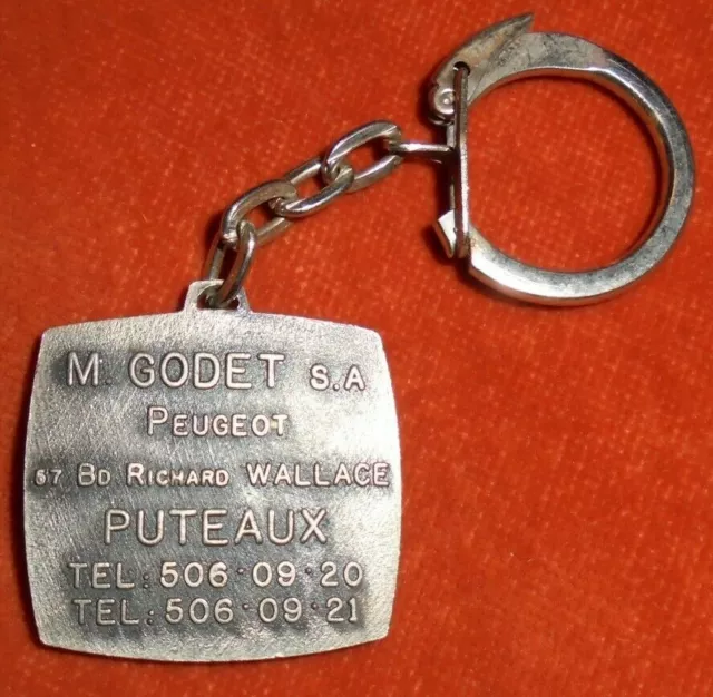 Porte-clés Key ring LION Peugeot Auto GODET S.A Bd R. Wallace PUTEAUX Tacot 1892