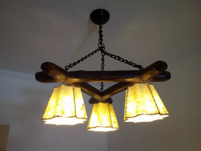 lampara de techo con cadenas de autentico hierro forjado , piel de cordero -lujo
