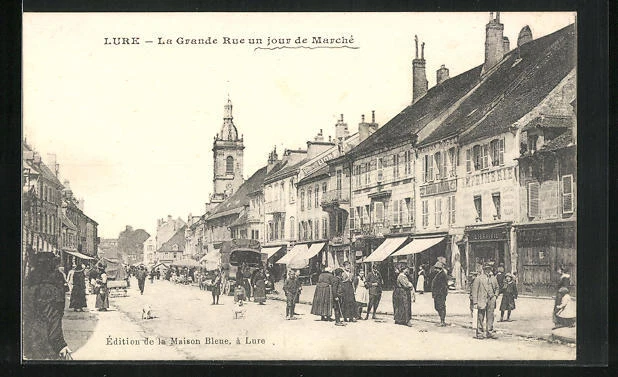 CPA Lure, La Grande Rue un jour de Marche