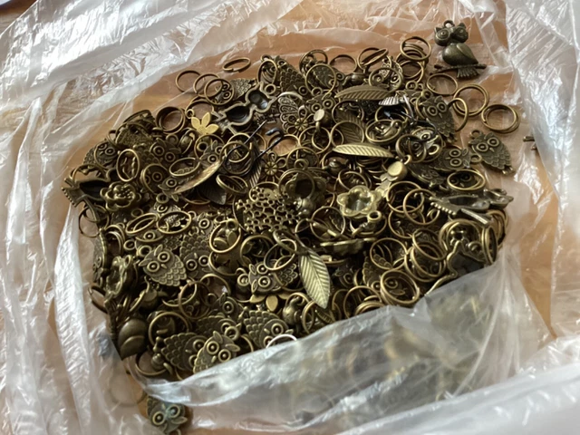 JOB LOT OF CRAFTING CHARMS APPROX 100. Brass coloured metal (12) lots of owls