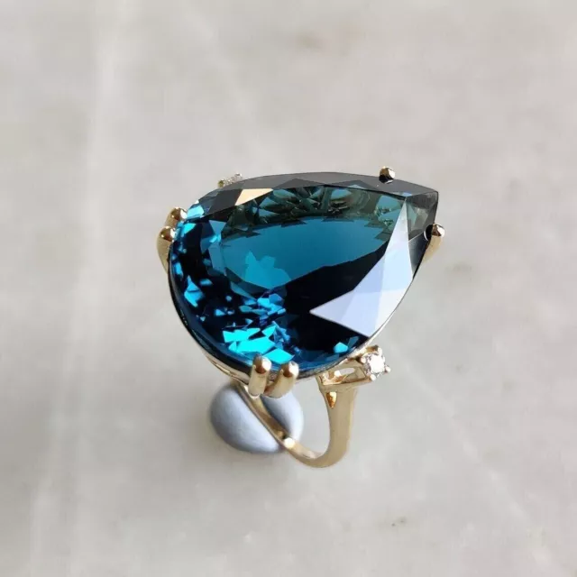 Natural London Blue Topaz and MOISSANITES Cocktail Women Ring in 10k Yellow Gold