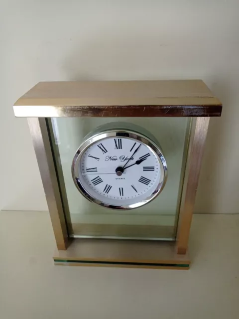 Very heavy Glass with Gold Frame Mantle Clock New York silver face. Used